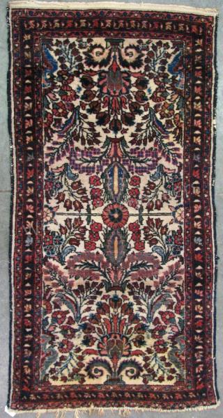 Appraisal: An antique Oriental area rug traditional Persian design cream field