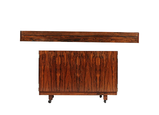 Appraisal: Manner of Niels Otto MollerDanish rosewood wall-hanging console serving table