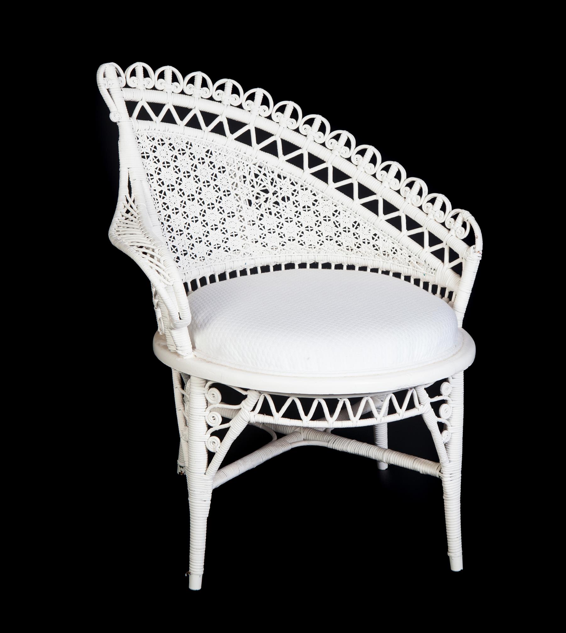 Appraisal: WICKER STUDIO CHAIR American ca Wicker with intricate weaving and