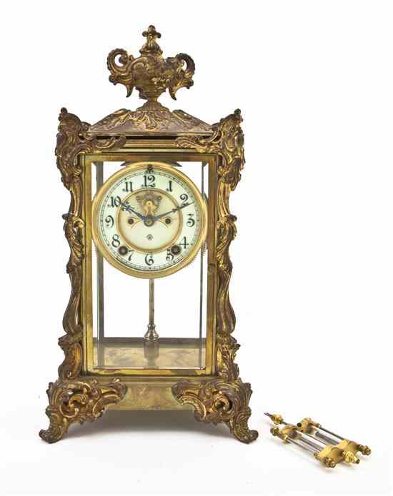 Appraisal: An Ansonia Brass Crystal Regulator Clock having an urn form