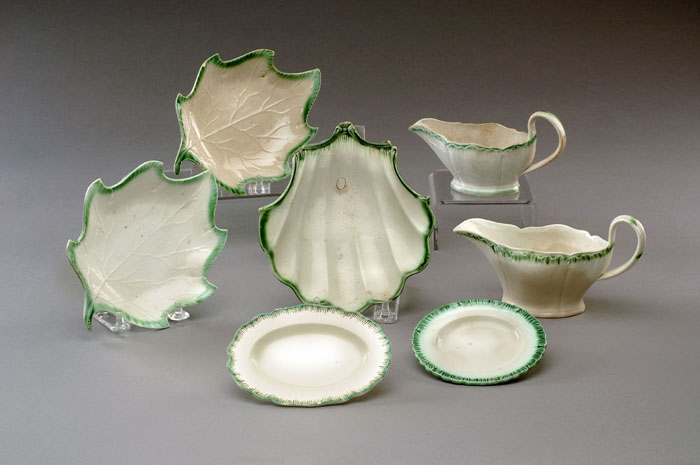 Appraisal: SEVEN ENGLISH PEARLWARE GREEN FEATHER-EDGE TABLEWARES Including two leaf form