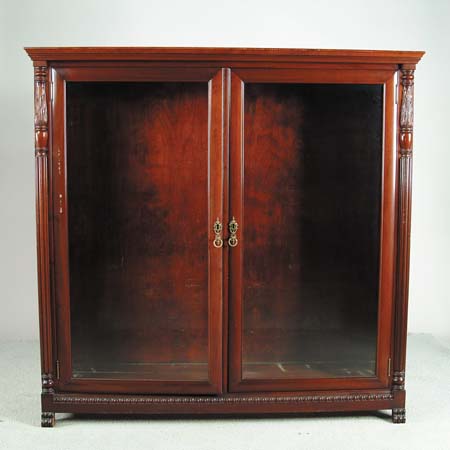 Appraisal: FINE MAHOGANY TWO DOOR GLASS FRONT BOOKCASE Half carved and