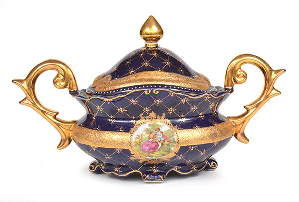 Appraisal: A LIMOGES COBALT BLUE AND GILT PORCELAIN TWO HANDLED TUREEN