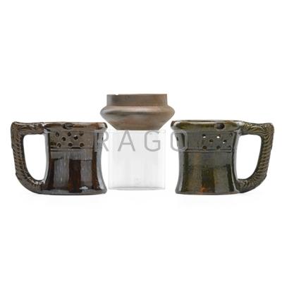 Appraisal: GEORGE OHR - Two puzzle mugs and a bisque cabinet