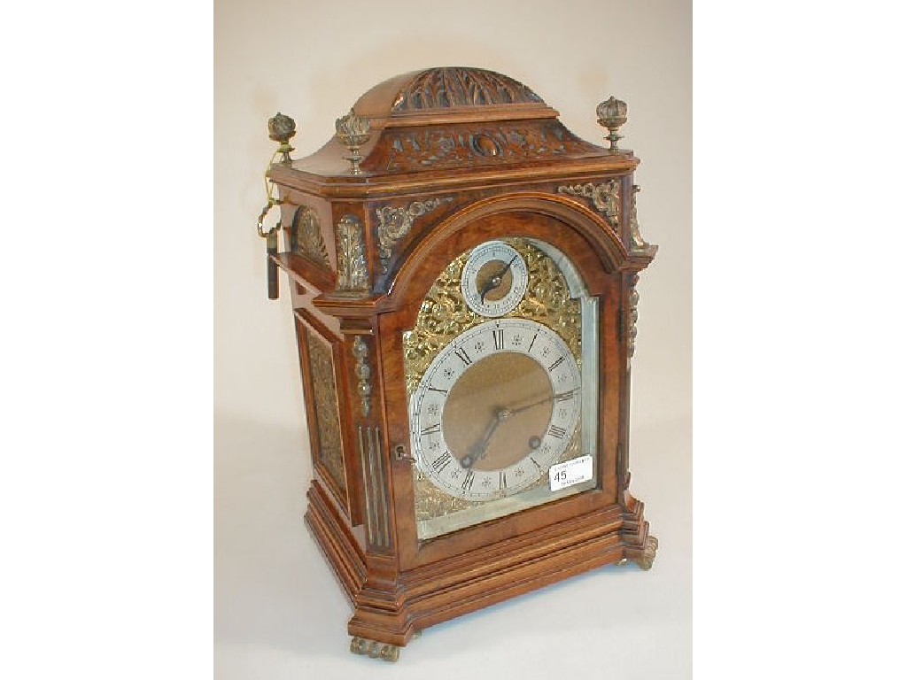 Appraisal: A late thC carved walnut and burr veneered bracket clock