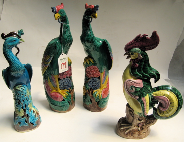 Appraisal: FOUR CHINESE POTTERY FIGURAL BIRDS hand painted colorful variety including