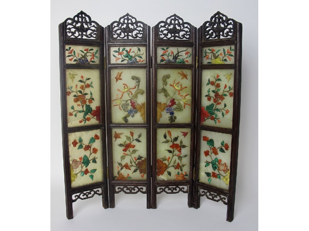 Appraisal: A Chinese hardstone four fold screen decorated with birds flowers