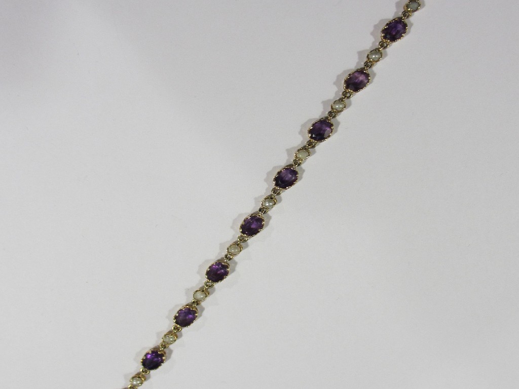 Appraisal: Nine carat gold mounted amethyst and seed pearl set bracelet