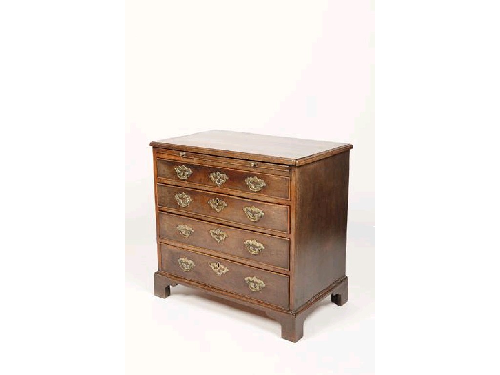 Appraisal: A GEORGE II MAHOGANY CHEST OF DRAWERS the rectangular top