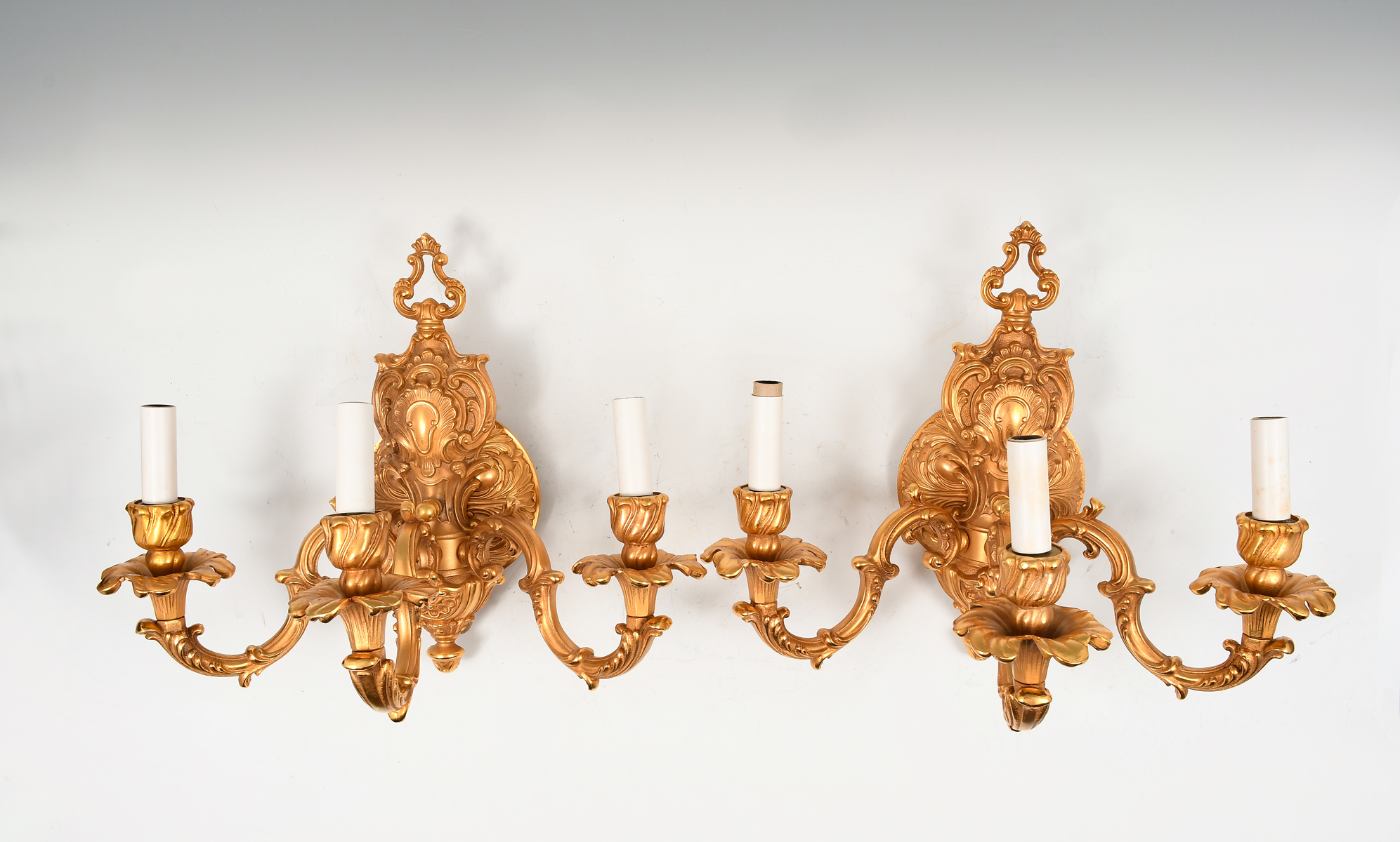 Appraisal: PAIR OF ITALIAN DORE ELECTRIFIED LIGHT SCONCES Overall scrolling foliate