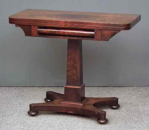 Appraisal: An early Victorian mahogany rectangular card table with rounded front