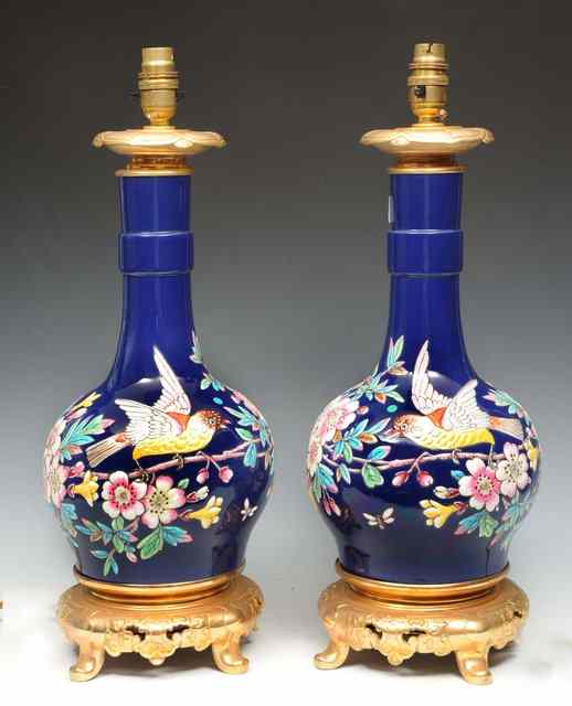 Appraisal: A PAIR OF TABLE LAMPS in the form of blue