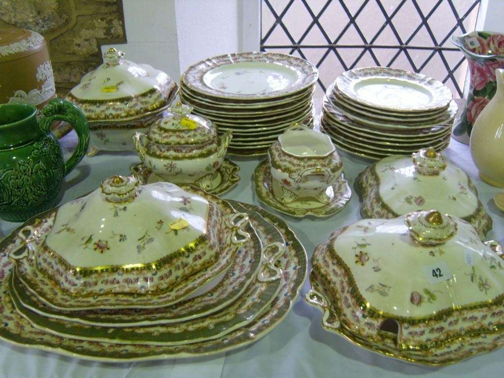 Appraisal: An extensive collection of late Victorian dinner wares with green