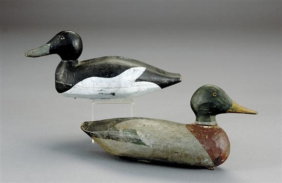 Appraisal: Two duck decoys th centurypainted carved wood weighted figures H