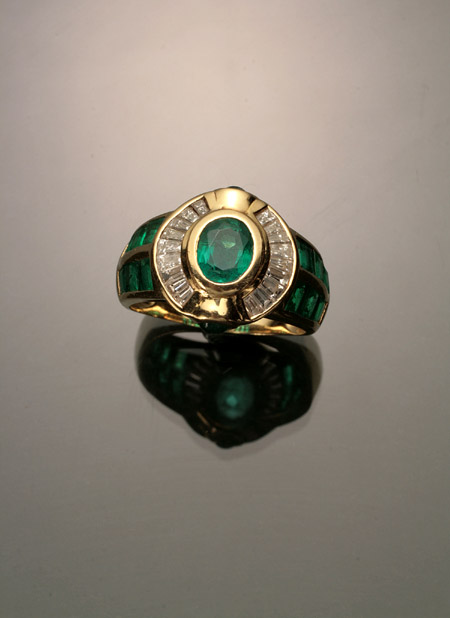 Appraisal: -Karat Yellow-Gold Emerald and Diamond Dinner Ring Having one oval