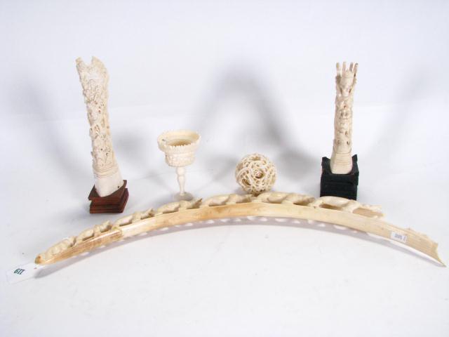 Appraisal: Carved ivory tusk with elephants approximately long damaged missing two