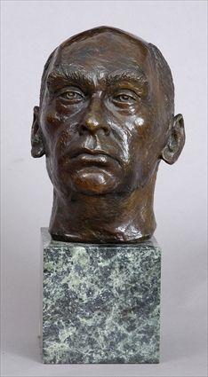 Appraisal: BRONZE HEAD OF A MAN Facing forward with balding hair