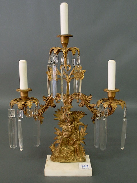 Appraisal: Gilt metal centerpiece girandole th c on a marble base