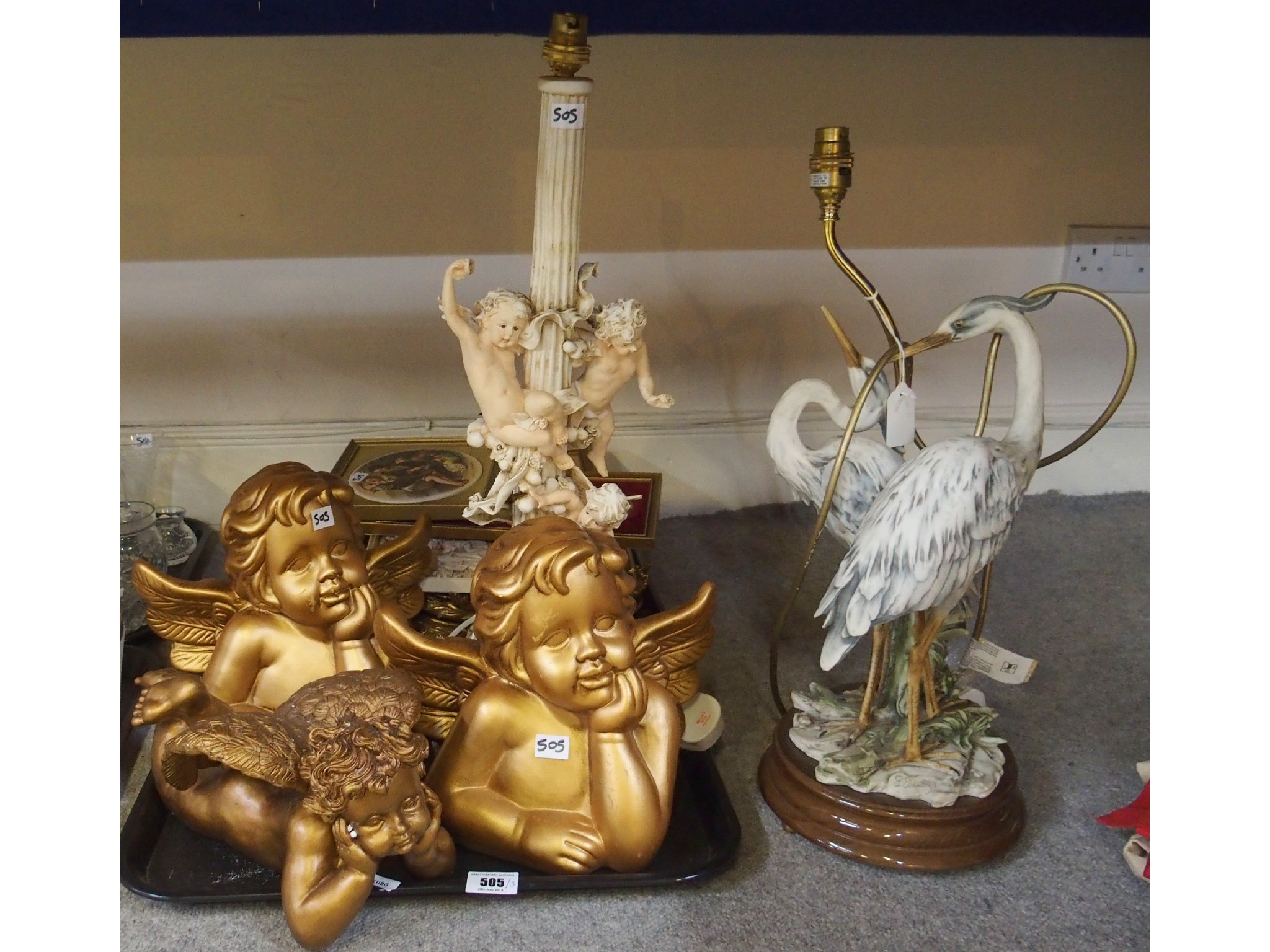 Appraisal: Heron table lamp pair of cherubs cherub decorated lamp framed