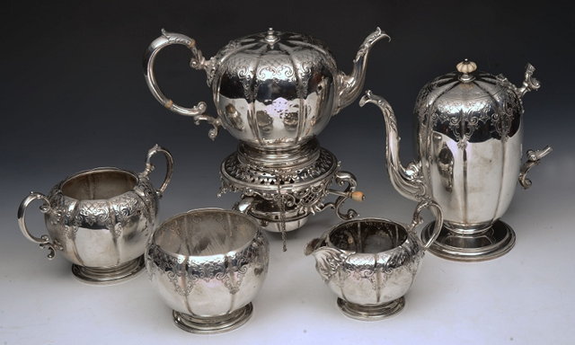 Appraisal: AN AMERICAN STERLING SILVER FIVE PIECE TEA SET the gourd