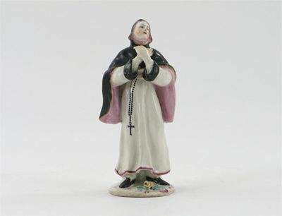 Appraisal: A Bow figure of a nun standing with hands crossed