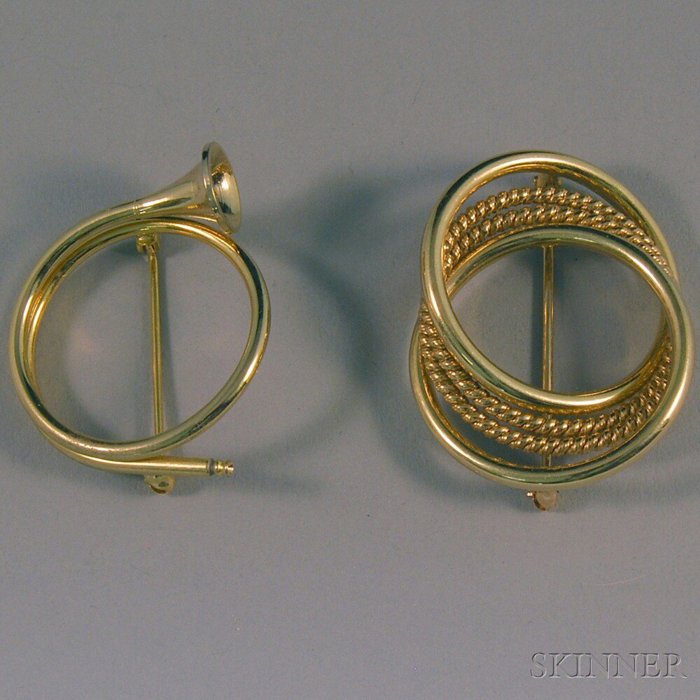 Appraisal: Two Brooches a kt gold interlocking circle brooch and a