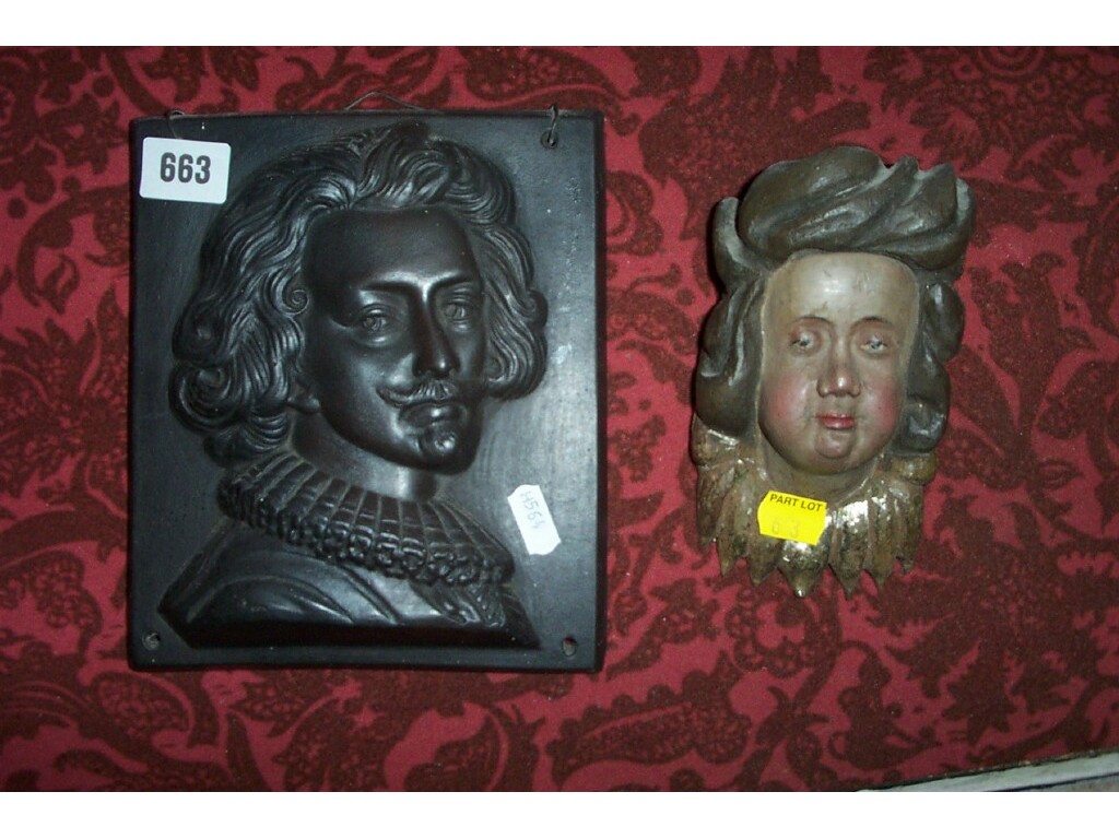 Appraisal: A late th century pottery wall plaque showing the head