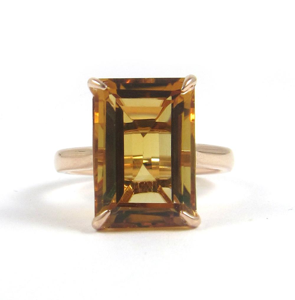 Appraisal: CITRINE AND FOURTEEN KARAT GOLD SOLITAIRE RING The k rose