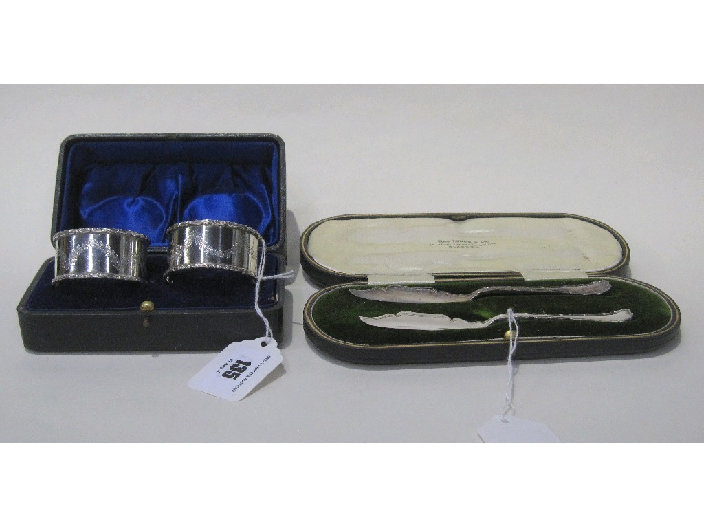 Appraisal: Lot comprising cased pair of silver napkin rings and a