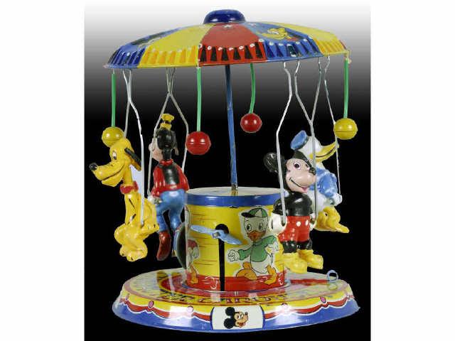 Appraisal: Linemar Tin Walt Disney Character Carousel Toy Description Wind-up Working