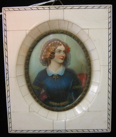 Appraisal: MINIATURE OVAL OIL PAINTING Portrait of a beautiful young woman