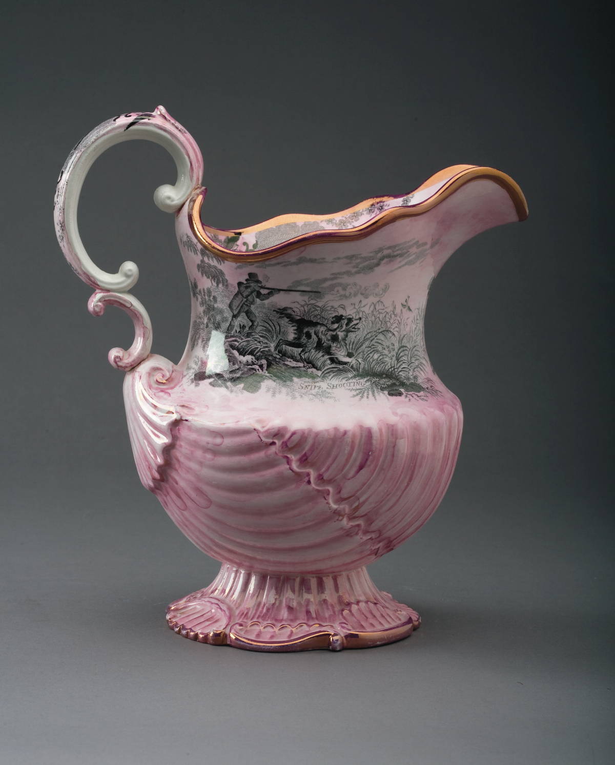 Appraisal: BRITISH PINK AND PURPLE LUSTRE AND BLACK TRANSFER-PRINTED SPORTING PITCHER