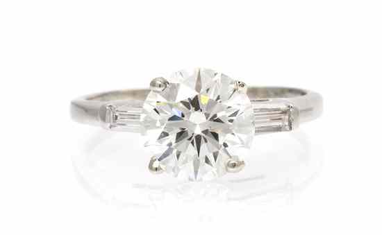 Appraisal: A Platinum and Diamond Ring containing one round brilliant cut