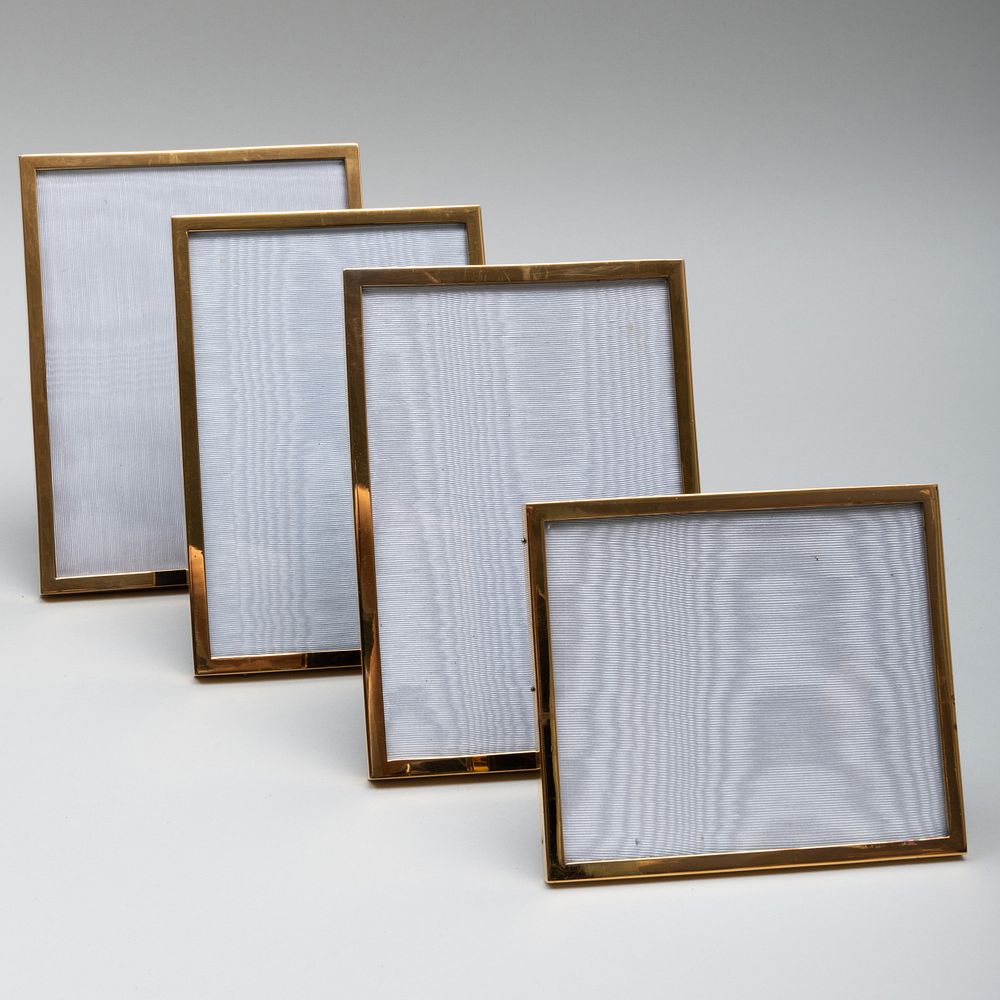 Appraisal: Four Jean Dinh Van Paris Silver-Gilt Picture Frames Each marked