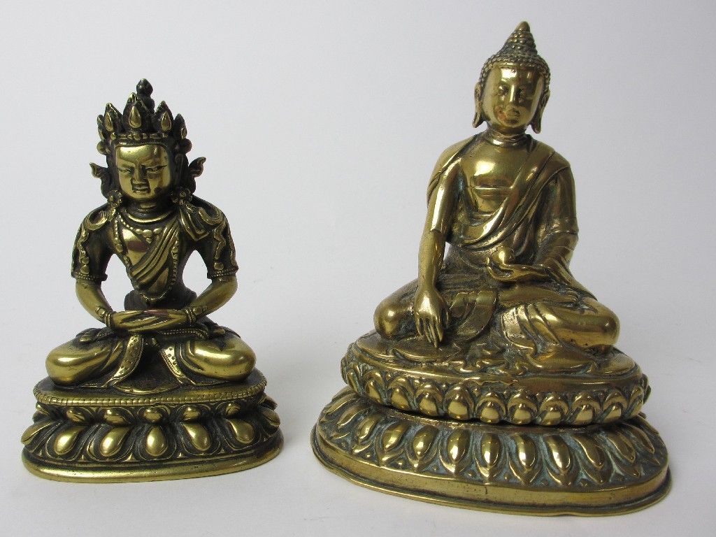 Appraisal: A Burmese bronze model of a Buddha seated on a