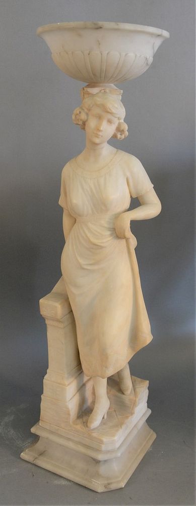 Appraisal: Marble figural sculpture standing woman having column with a bowl