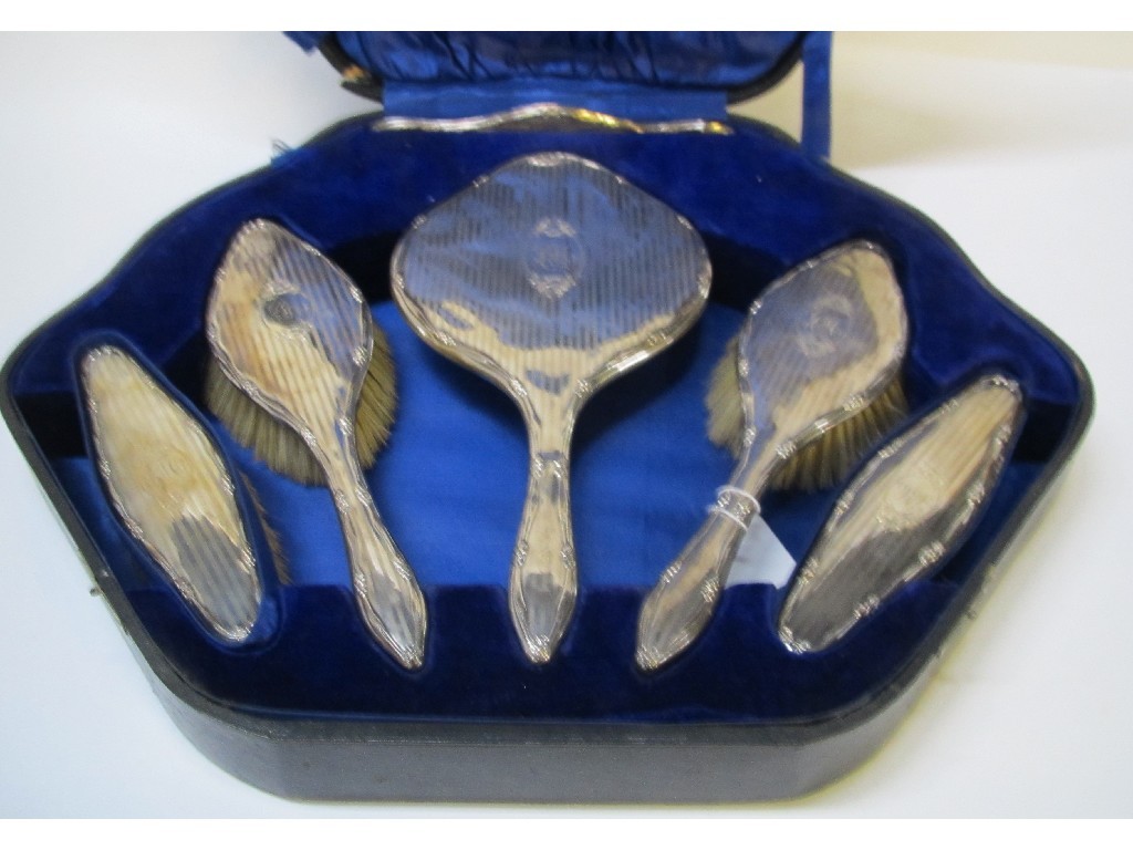 Appraisal: Cased six piece silver mounted dressing table set Birmingham