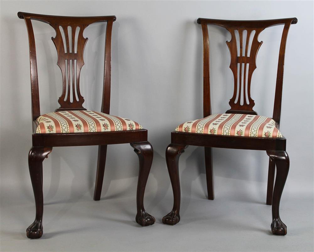 Appraisal: PAIR CHIPPENDALE STYLE CARVED MAHOGANY SIDE CHAIRS with straight scrolling