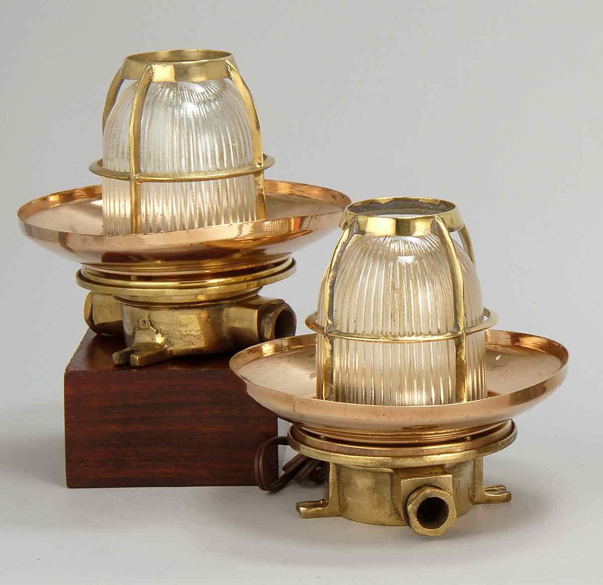 Appraisal: PAIR OF COPPER AND BRASS BULKHEAD LIGHTS With copper hood