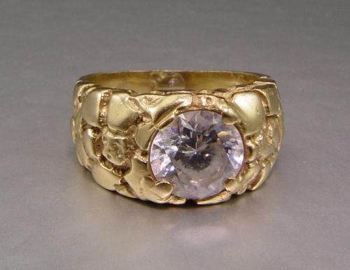 Appraisal: K YELLOW GOLD NUGGET STYLE RING At the center is