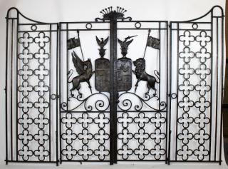 Appraisal: French forged iron entry gates with coat of arms with