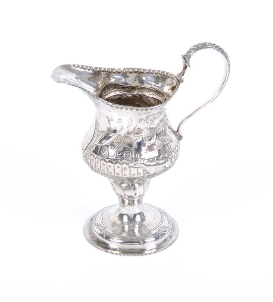 Appraisal: An English Sterling Silver Cream Jug London Height inches