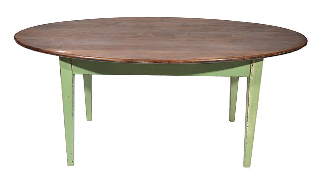 Appraisal: A FRENCH COUNTRY MADE FRUITWOOD OVAL DINING TABLE the green