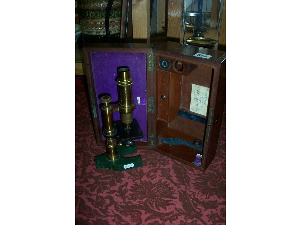 Appraisal: A late th century brass and iron microscope by J