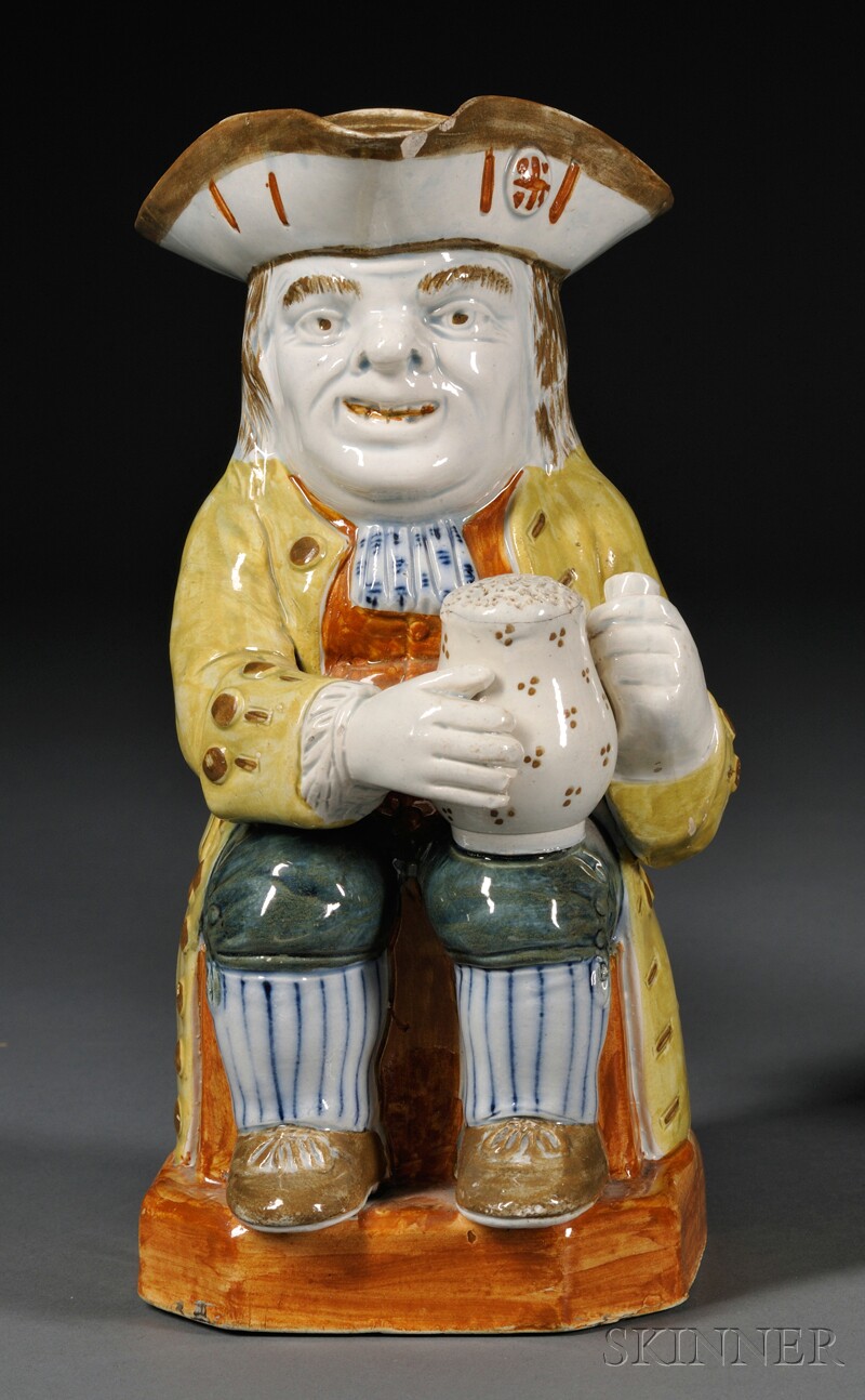 Appraisal: Pratt-type Staffordshire Toby Jug England c typical underglaze enamels to