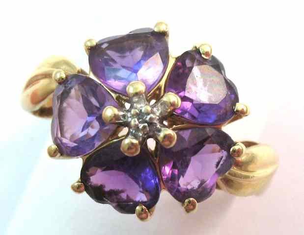 Appraisal: AMETHYST DIAMOND AND YELLOW GOLD RING The k gold ring