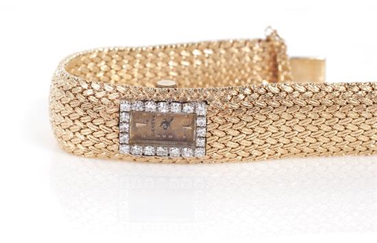 Appraisal: Swiss diamond and gold wristwatch integrated K gold mesh bracelet