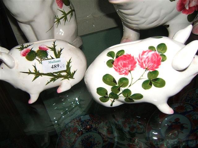 Appraisal: A pottery piggy bank by Plichta London decorated with thistles