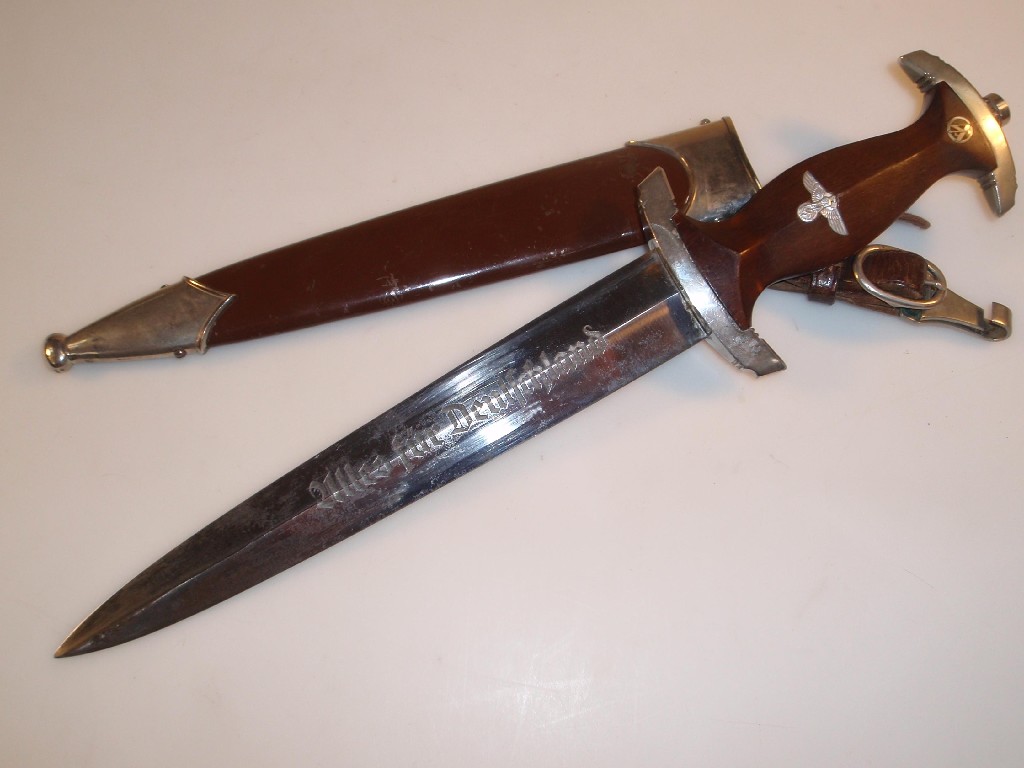 Appraisal: A German Nazi SA dagger the double edge steel blade