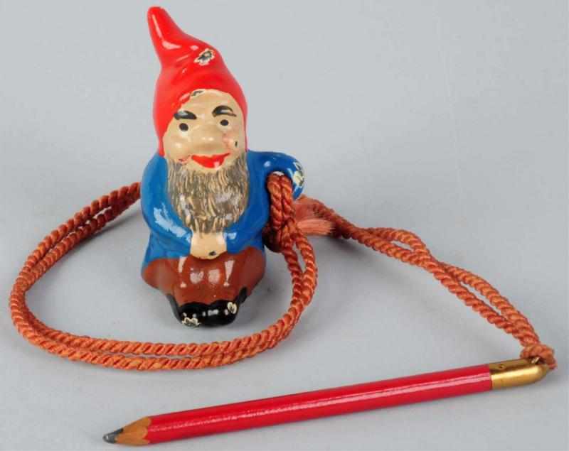 Appraisal: Cast Iron Gnome Figural Paperweight Spencer Includes original rope and